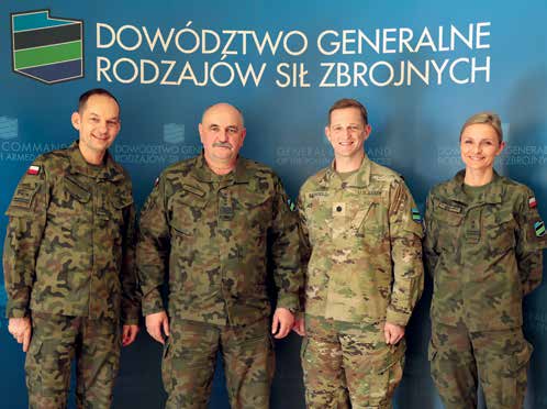 The Polish General Command legal team with General Mika: From L to R, Colonel Jacek Dzioba, GEN (Ret.)
        Jaroslaw Mika, LTC Robert N. Michaels, and Lt.Col. Malgorzata Starzomska. (Photo courtesy of authors)